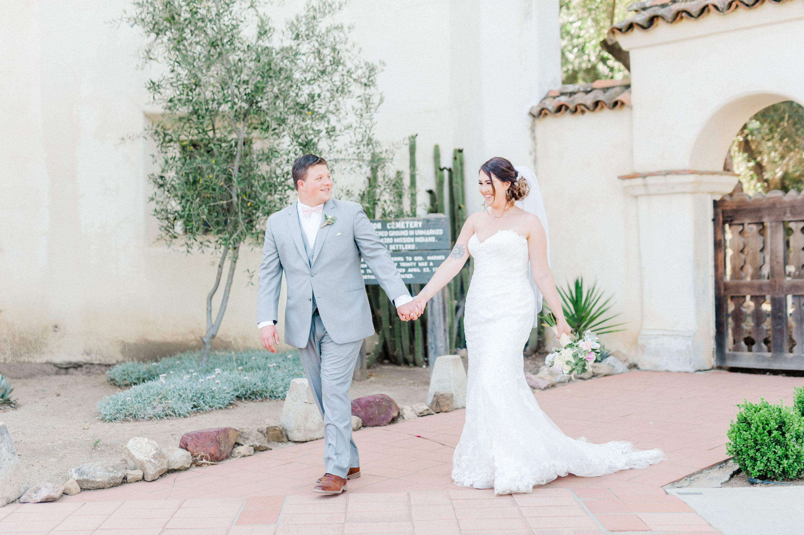 Couple holding hands and walking